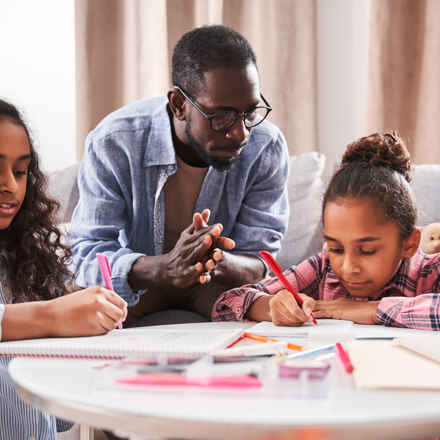 Father with two daughters, drawing