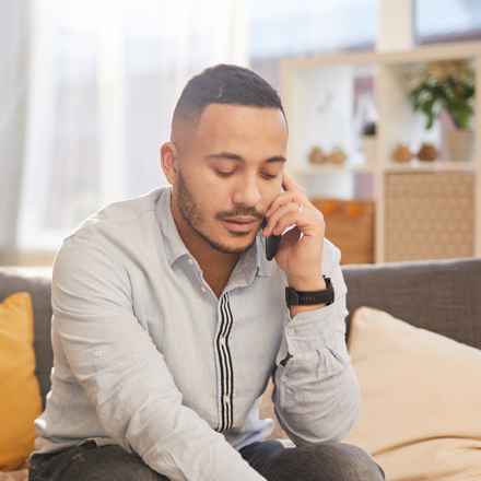 Man on phone counselling