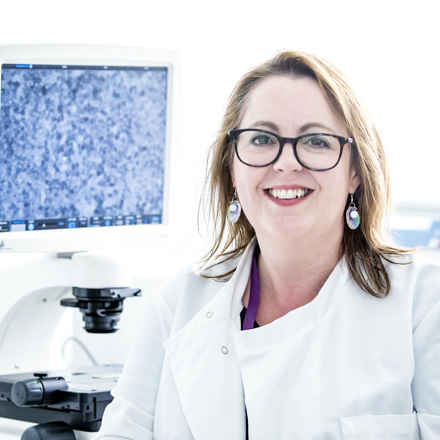 Amanda Carr in lab coat