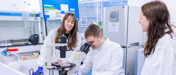 Dr Hill and team in the research lab
