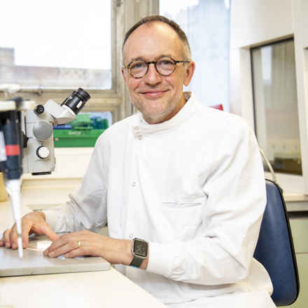 Andrew Dick looking into camera