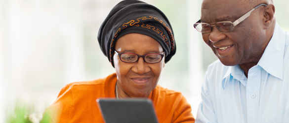 Couple looking at tablet