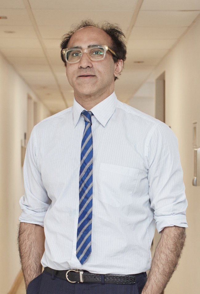 Picture shows Mahi Muqit in a shirt and tie looking at the camera